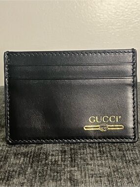 Authentic Gucci Logo print bifold wallet